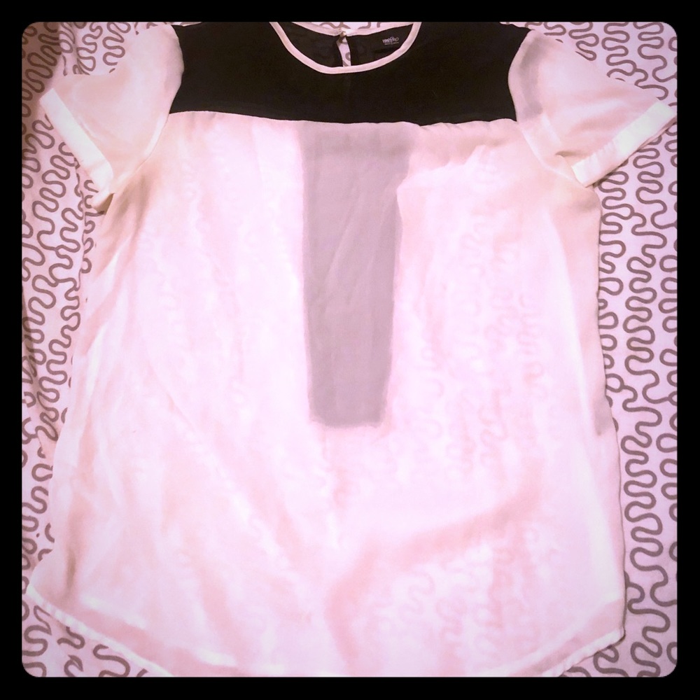 Black and white colour-blocked blouse.